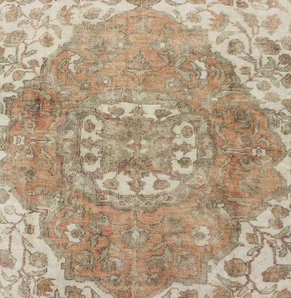 Vintage Turkish Oushak Rug in Peach, Ivory, Light Blue, and Light Green Measures: 6'9 x 9'3. This wonderful medallion Oushak features a soft color palette. The border has flowers connected by vines while the field also features a flower... - Keivan Woven ArtsEN - 92744 - 1656Rug