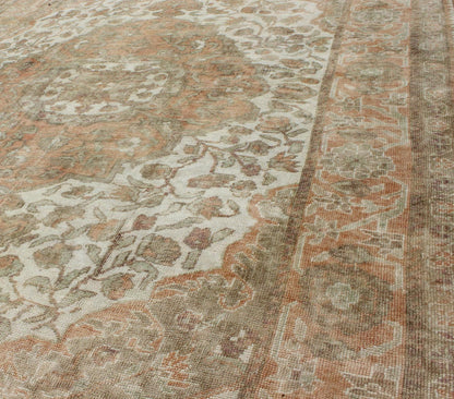 Vintage Turkish Oushak Rug in Peach, Ivory, Light Blue, and Light Green Measures: 6'9 x 9'3. This wonderful medallion Oushak features a soft color palette. The border has flowers connected by vines while the field also features a flower... - Keivan Woven ArtsEN - 92744 - 1656Rug