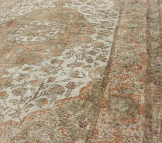 Vintage Turkish Oushak Rug in Peach, Ivory, Light Blue, and Light Green Measures: 6'9 x 9'3. This wonderful medallion Oushak features a soft color palette. The border has flowers connected by vines while the field also features a flower... - Keivan Woven ArtsEN - 92744 - 1656Rug