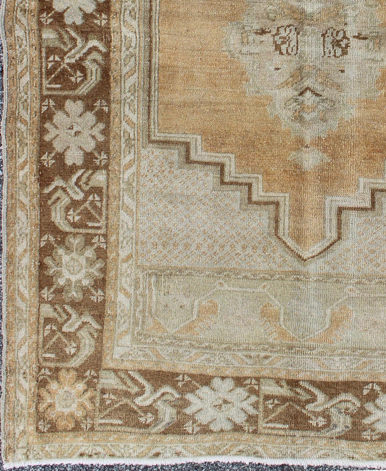 Vintage Oushak Rug in Brown, L. Orange, Camel & L. Taupe Gray. Vintage medallion Oushak in soft tones and brown border, Keivan Woven Arts/ rug, EN - 92950, Origin/ Turkey, Circa Mid century, All wool hand knotted vintage rug, Vintage Turkish rug, vintage... - Keivan Woven ArtsEN - 92950 - 1666Rug