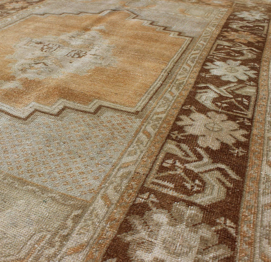 Vintage Oushak Rug in Brown, L. Orange, Camel & L. Taupe Gray. Vintage medallion Oushak in soft tones and brown border, Keivan Woven Arts/ rug, EN - 92950, Origin/ Turkey, Circa Mid century, All wool hand knotted vintage rug, Vintage Turkish rug, vintage... - Keivan Woven ArtsEN - 92950 - 1666Rug