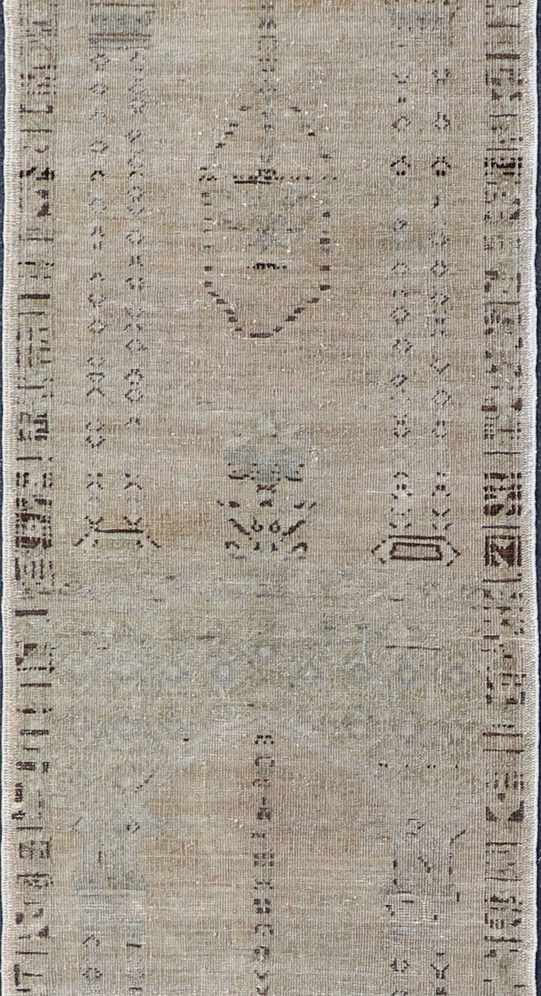 Skinny Long Turkish Runner with Floral Design in Taupe, Gray, and Brown. Distressed Turkish long and narrow runner with floral design and neutral colors. rug/EN - 94027, 1940 vintage Oushak runner Measures:2'5 x 17'3 This vintag... - Keivan Woven ArtsEN - 94027 - 1863Rug