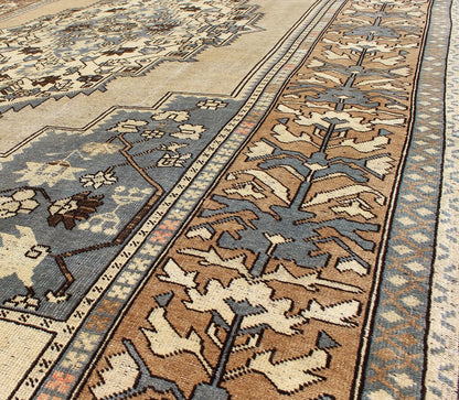 Vintage Turkish Medallion Oushak Rug in Rustic Blue, Mocha, and Taupe Measures: 7'2 x 12'9 Unique in its color palette and composition, this vintage Oushak features large - scale motifs and a central medallion. The field design is rendered... - Keivan Woven ArtsEN - 94123 - 3814Rug