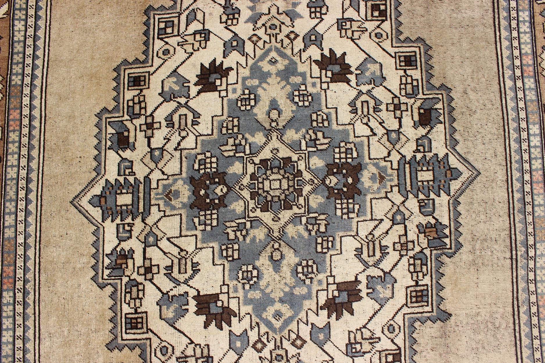 Vintage Turkish Medallion Oushak Rug in Rustic Blue, Mocha, and Taupe Measures: 7'2 x 12'9 Unique in its color palette and composition, this vintage Oushak features large - scale motifs and a central medallion. The field design is rendered... - Keivan Woven ArtsEN - 94123 - 3814Rug