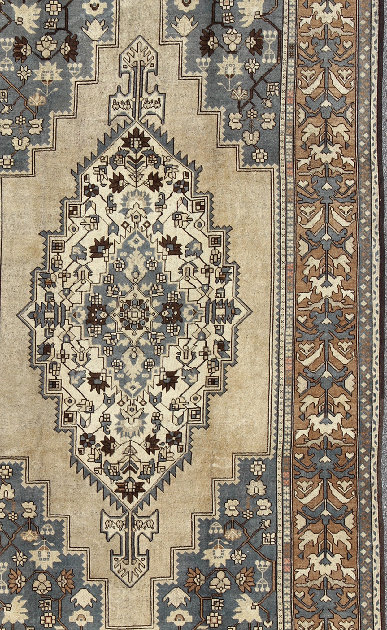 Vintage Turkish Medallion Oushak Rug in Rustic Blue, Mocha, and Taupe Measures: 7'2 x 12'9 Unique in its color palette and composition, this vintage Oushak features large - scale motifs and a central medallion. The field design is rendered... - Keivan Woven ArtsEN - 94123 - 3814Rug