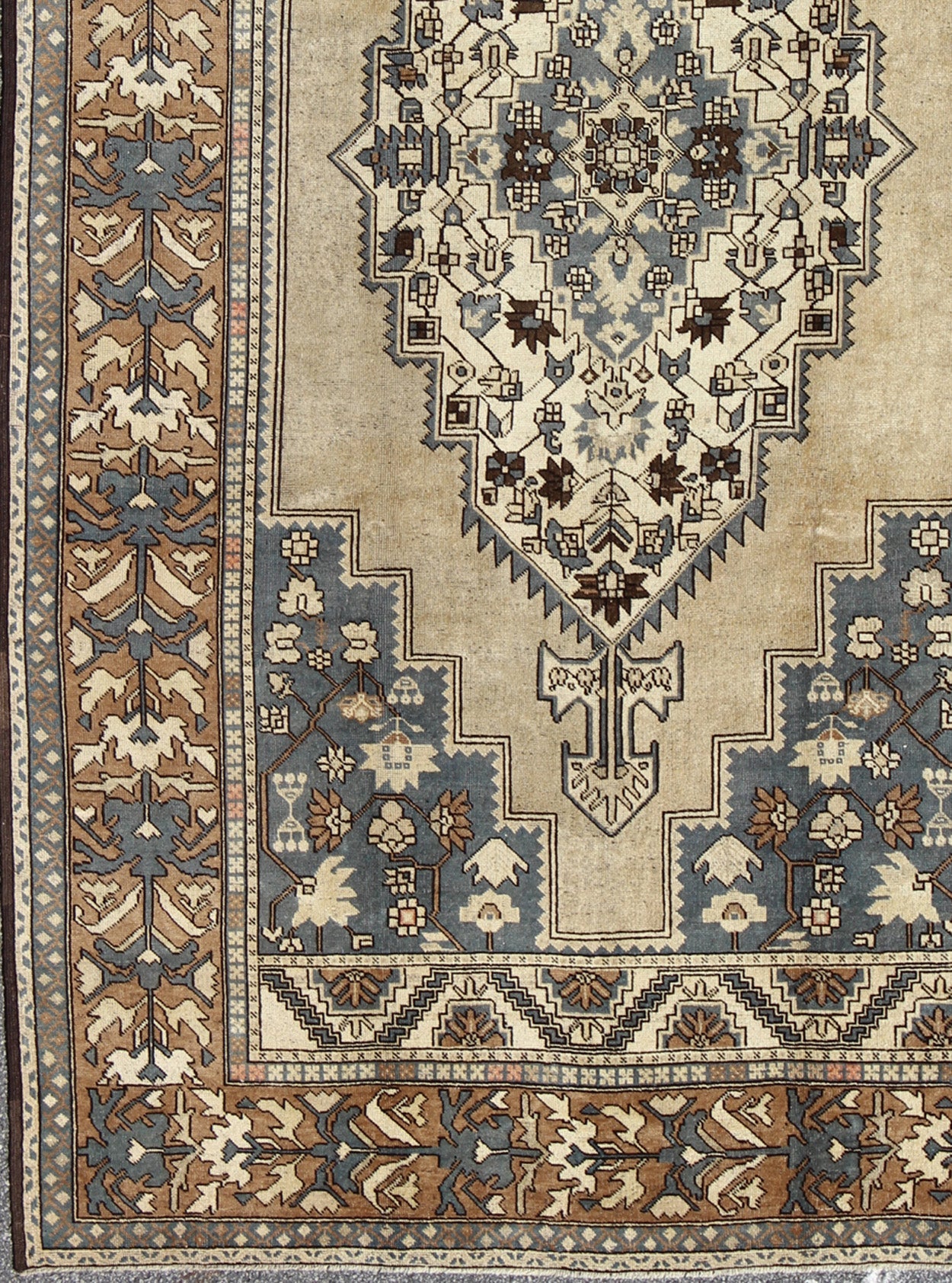 Vintage Turkish Medallion Oushak Rug in Rustic Blue, Mocha, and Taupe Measures: 7'2 x 12'9 Unique in its color palette and composition, this vintage Oushak features large - scale motifs and a central medallion. The field design is rendered... - Keivan Woven ArtsEN - 94123 - 3814Rug