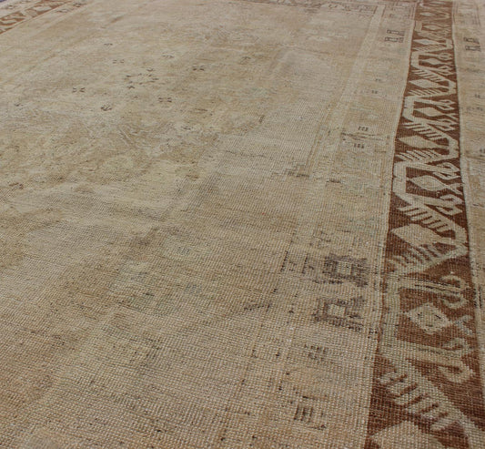 Vintage Turkish Diamond Medallion Oushak in Neutral Earth Tones Measures: 5'8 x 9'1 Characterized by a comely and highly representative Oushak composition, this vintage Oushak carpet beautifully communicates the finer strength of Oushak r... - Keivan Woven ArtsEN - 946 - 7821Rug