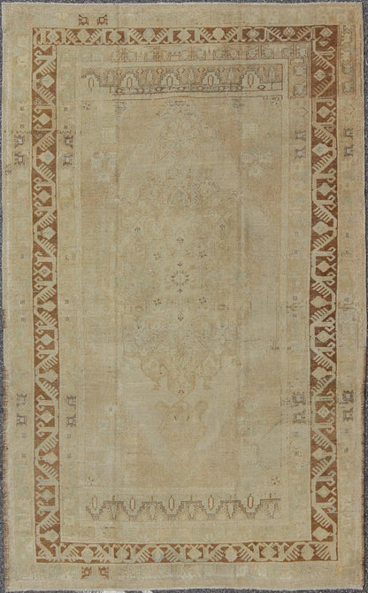 Vintage Turkish Diamond Medallion Oushak in Neutral Earth Tones Measures: 5'8 x 9'1 Characterized by a comely and highly representative Oushak composition, this vintage Oushak carpet beautifully communicates the finer strength of Oushak r... - Keivan Woven ArtsEN - 946 - 7821Rug