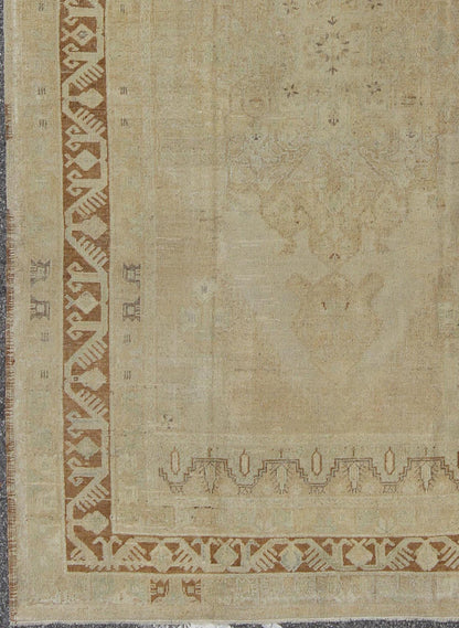 Vintage Turkish Diamond Medallion Oushak in Neutral Earth Tones Measures: 5'8 x 9'1 Characterized by a comely and highly representative Oushak composition, this vintage Oushak carpet beautifully communicates the finer strength of Oushak r... - Keivan Woven ArtsEN - 946 - 7821Rug