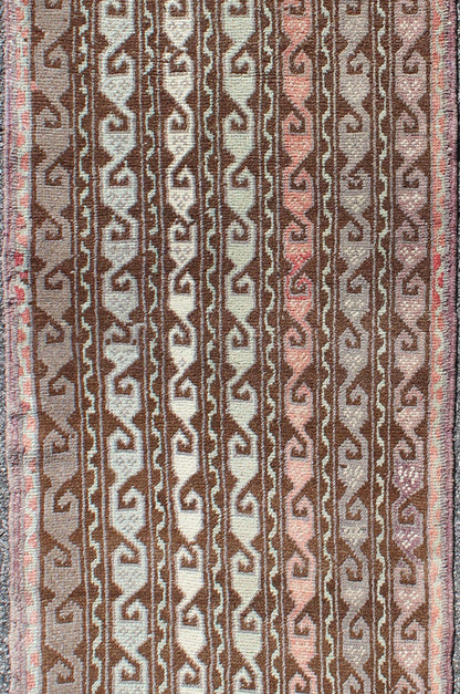 Brown and pastel - colored vintage Turkish Oushak runner with vining geometrics, rug en - 957, country of origin / type: Turkey / Oushak, circa 1930 This vintage Turkish gallery runner (circa 1930) features a unique blend of colors and an intricatel... - Keivan Woven ArtsEN - 957 - 3411Rug