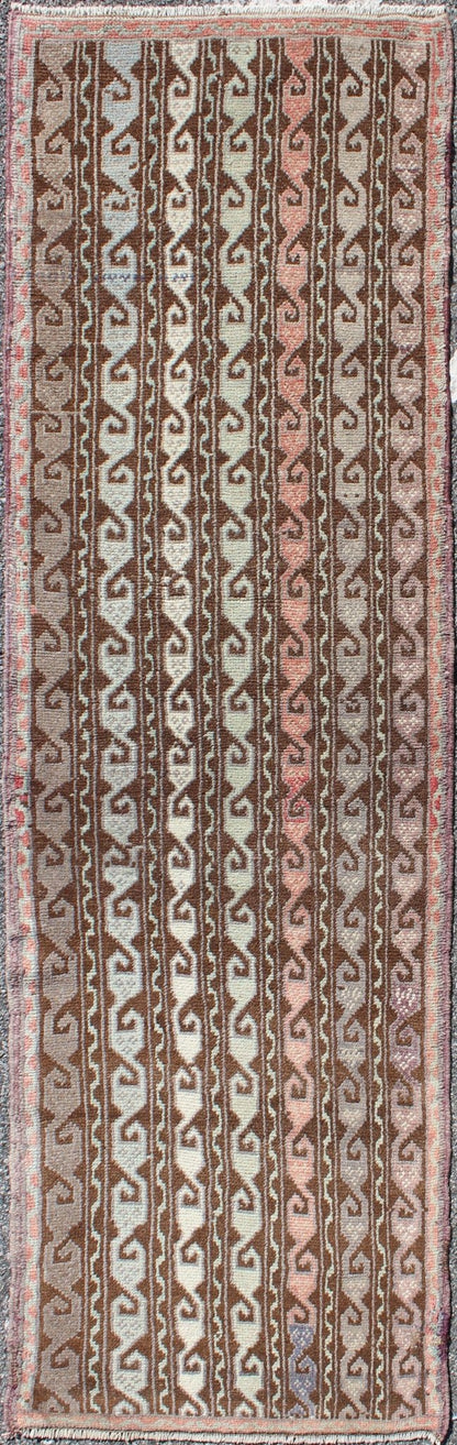 Brown and pastel - colored vintage Turkish Oushak runner with vining geometrics, rug en - 957, country of origin / type: Turkey / Oushak, circa 1930 This vintage Turkish gallery runner (circa 1930) features a unique blend of colors and an intricatel... - Keivan Woven ArtsEN - 957 - 3411Rug