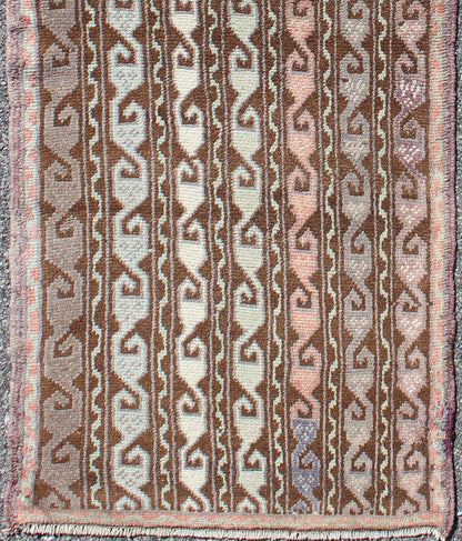 Brown and pastel - colored vintage Turkish Oushak runner with vining geometrics, rug en - 957, country of origin / type: Turkey / Oushak, circa 1930 This vintage Turkish gallery runner (circa 1930) features a unique blend of colors and an intricatel... - Keivan Woven ArtsEN - 957 - 3411Rug