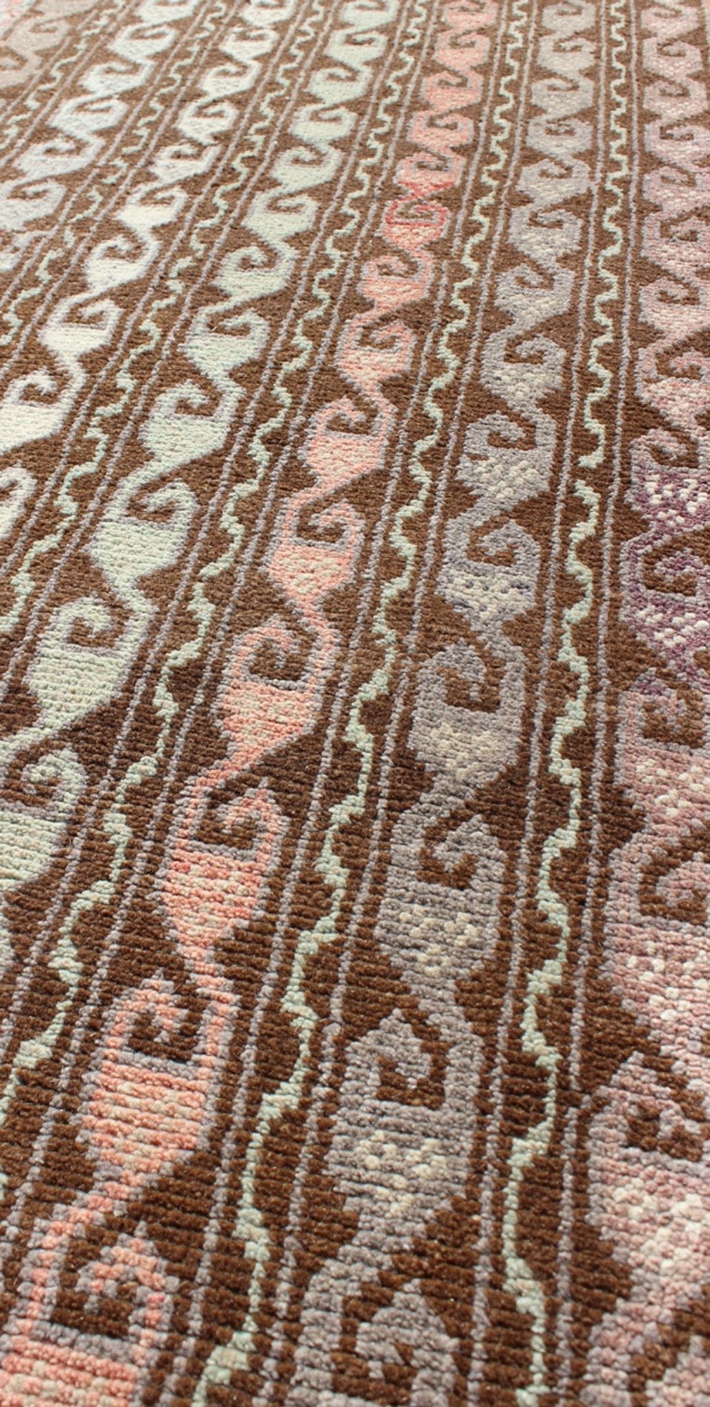 Brown and pastel - colored vintage Turkish Oushak runner with vining geometrics, rug en - 957, country of origin / type: Turkey / Oushak, circa 1930 This vintage Turkish gallery runner (circa 1930) features a unique blend of colors and an intricatel... - Keivan Woven ArtsEN - 957 - 3411Rug