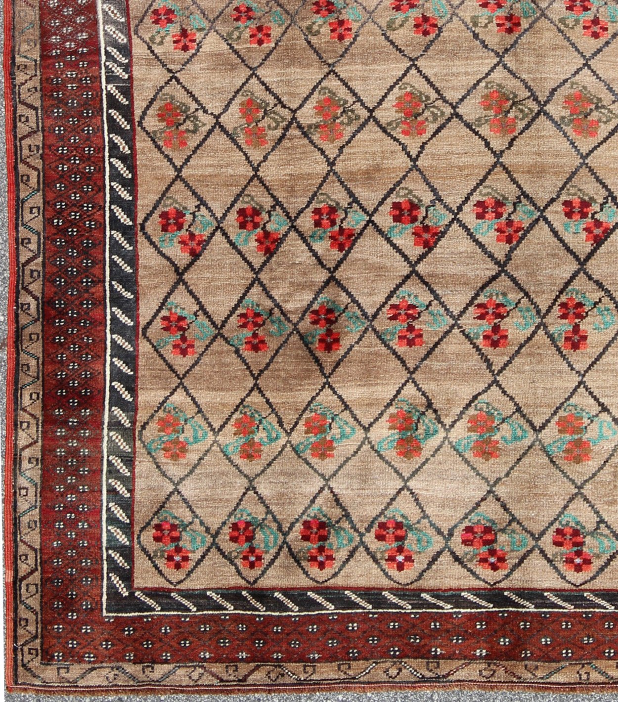 Turkish Konya Carpet in Camel Color Background, Red, Charcoal, Coral and Green. This colorful Turkish carpet rests beautifully upon a field of camel and light brown. A repeating flower pattern of taupe, green and gray takes center stage and is w... - Keivan Woven ArtsEN - 966 - 5434Rug