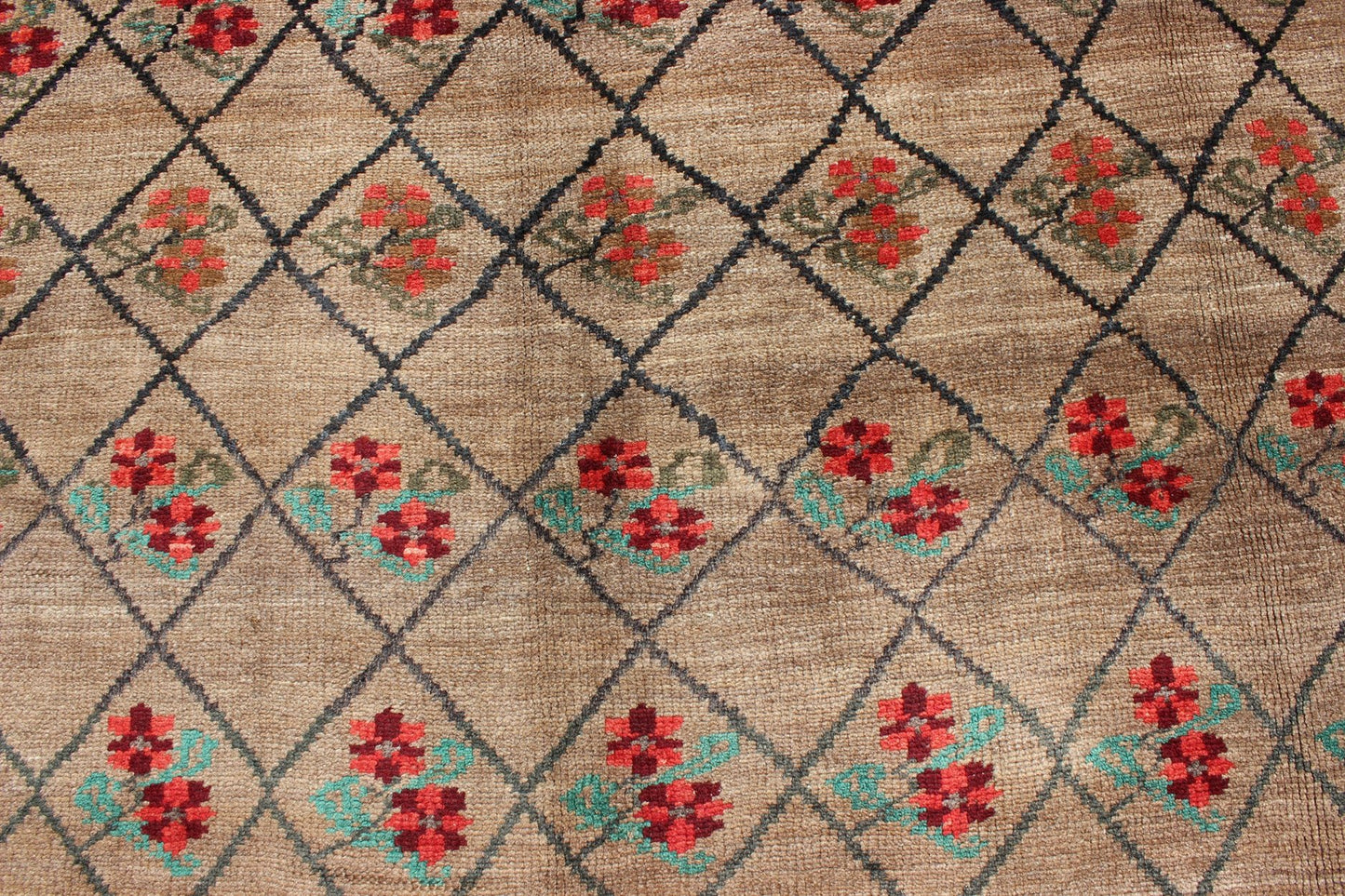 Turkish Konya Carpet in Camel Color Background, Red, Charcoal, Coral and Green. This colorful Turkish carpet rests beautifully upon a field of camel and light brown. A repeating flower pattern of taupe, green and gray takes center stage and is w... - Keivan Woven ArtsEN - 966 - 5434Rug
