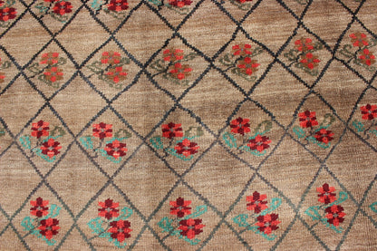 Turkish Konya Carpet in Camel Color Background, Red, Charcoal, Coral and Green. This colorful Turkish carpet rests beautifully upon a field of camel and light brown. A repeating flower pattern of taupe, green and gray takes center stage and is w... - Keivan Woven ArtsEN - 966 - 5434Rug