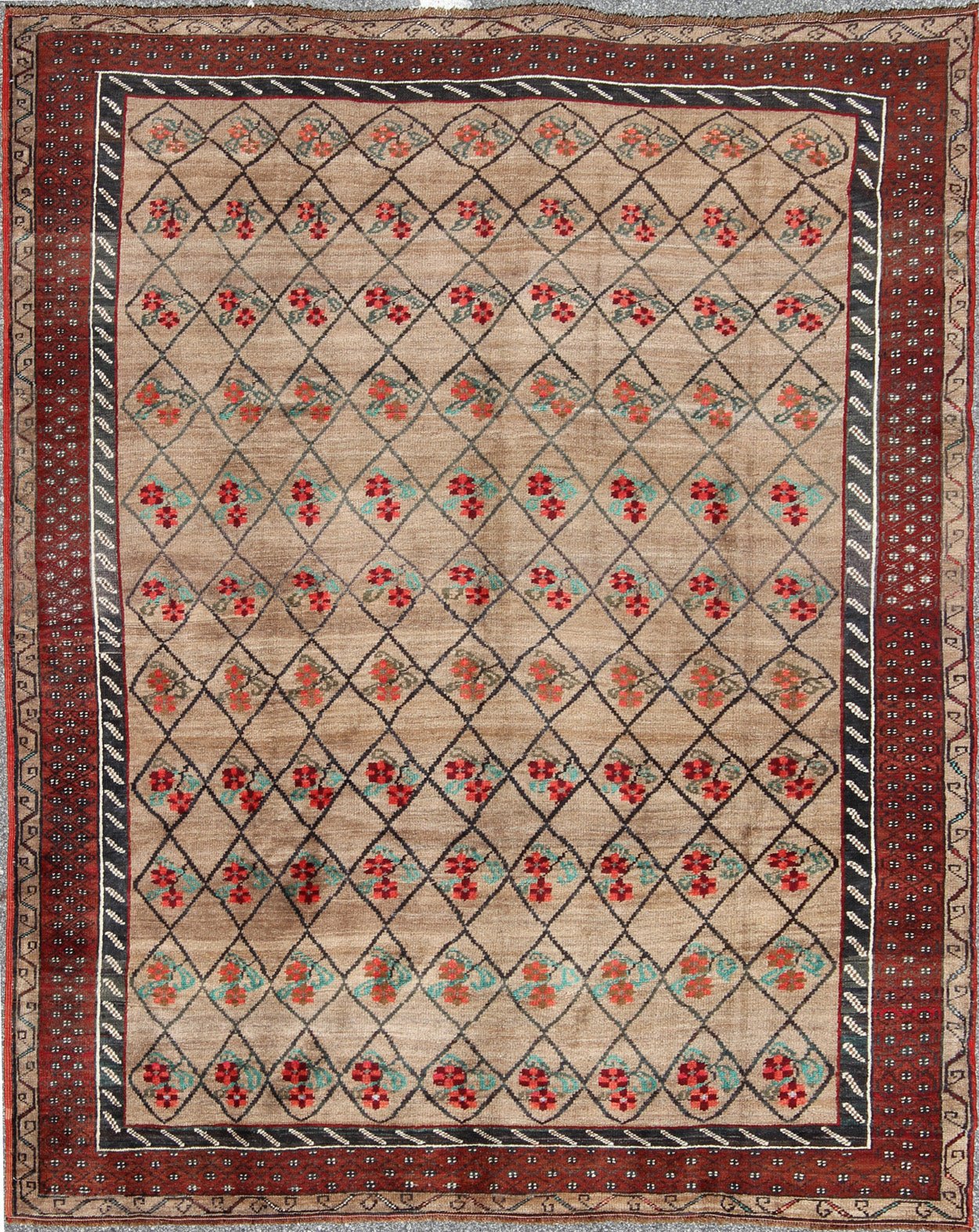Turkish Konya Carpet in Camel Color Background, Red, Charcoal, Coral and Green. This colorful Turkish carpet rests beautifully upon a field of camel and light brown. A repeating flower pattern of taupe, green and gray takes center stage and is w... - Keivan Woven ArtsEN - 966 - 5434Rug