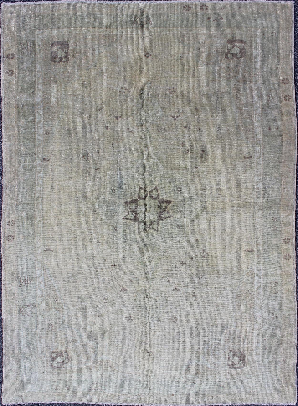 Muted Turkish Oushak Carpet with Centre Medallion Design in Grey, Sand & Taupe Turkish Oushak Carpet with Center Medallion Design rug/en - 977, origin/turkey kwarugs This magnificent muted Oushak from Turkey boasts a center medallion des... - Keivan Woven ArtsEN - 977 - 5977Rug