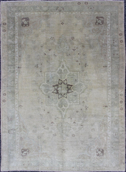 Muted Turkish Oushak Carpet with Centre Medallion Design in Grey, Sand & Taupe Turkish Oushak Carpet with Center Medallion Design rug/en - 977, origin/turkey kwarugs This magnificent muted Oushak from Turkey boasts a center medallion des... - Keivan Woven ArtsEN - 977 - 5977Rug