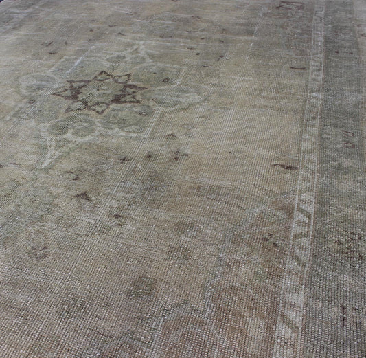 Muted Turkish Oushak Carpet with Centre Medallion Design in Grey, Sand & Taupe Turkish Oushak Carpet with Center Medallion Design rug/en - 977, origin/turkey kwarugs This magnificent muted Oushak from Turkey boasts a center medallion des... - Keivan Woven ArtsEN - 977 - 5977Rug