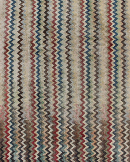 Mid - Century Turkish Modern Rug Rendered in zig - zag lines that run parallel to each other amidst an assortment of rich colors, this very unique rug showcases a modern design. Measures: 7'4 x 9'11. - Keivan Woven ArtsEN - 9801 - 4896Rug