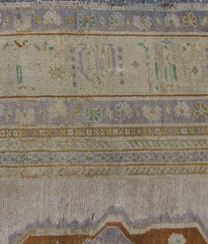 Vintage Turkish Oushak Rug in Brown, Pale Green, Taupe & Taupe Light Purple Measures 6'10 x 10'5 This softly colored Oushak carpet rests beautifully upon a field of elegant light taupe. A large medallion of lavender/gray and saddle brow... - Keivan Woven ArtsEN - 989 - 5265Rug