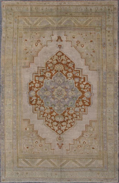 Vintage Turkish Oushak Rug in Brown, Pale Green, Taupe & Taupe Light Purple Measures 6'10 x 10'5 This softly colored Oushak carpet rests beautifully upon a field of elegant light taupe. A large medallion of lavender/gray and saddle brow... - Keivan Woven ArtsEN - 989 - 5265Rug