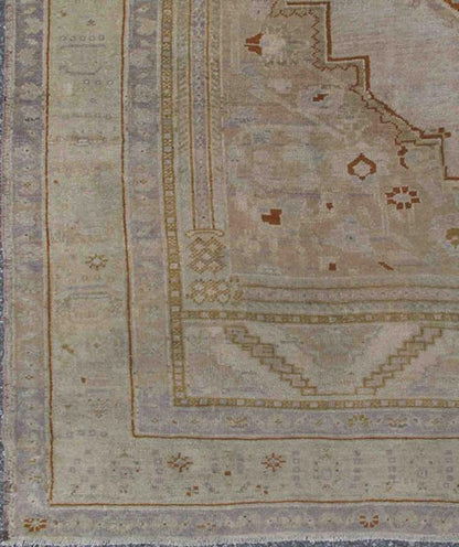 Vintage Turkish Oushak Rug in Brown, Pale Green, Taupe & Taupe Light Purple Measures 6'10 x 10'5 This softly colored Oushak carpet rests beautifully upon a field of elegant light taupe. A large medallion of lavender/gray and saddle brow... - Keivan Woven ArtsEN - 989 - 5265Rug