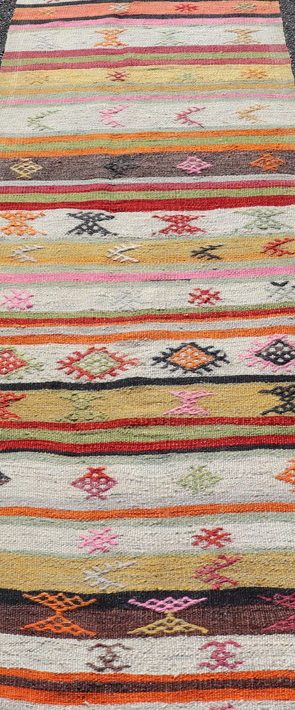 Vintage Hand Woven Turkish Kilim Colorful Stripe Runner with Tribal Motifs Colorful vintage Turkish Kilim runner with a stripe and modern design, Minimalist stripe design Kilim runner from Turkey. Keivan Woven Arts / rug EN - P13129, country of o... - Keivan Woven ArtsEN - P13129 - 17700Rug