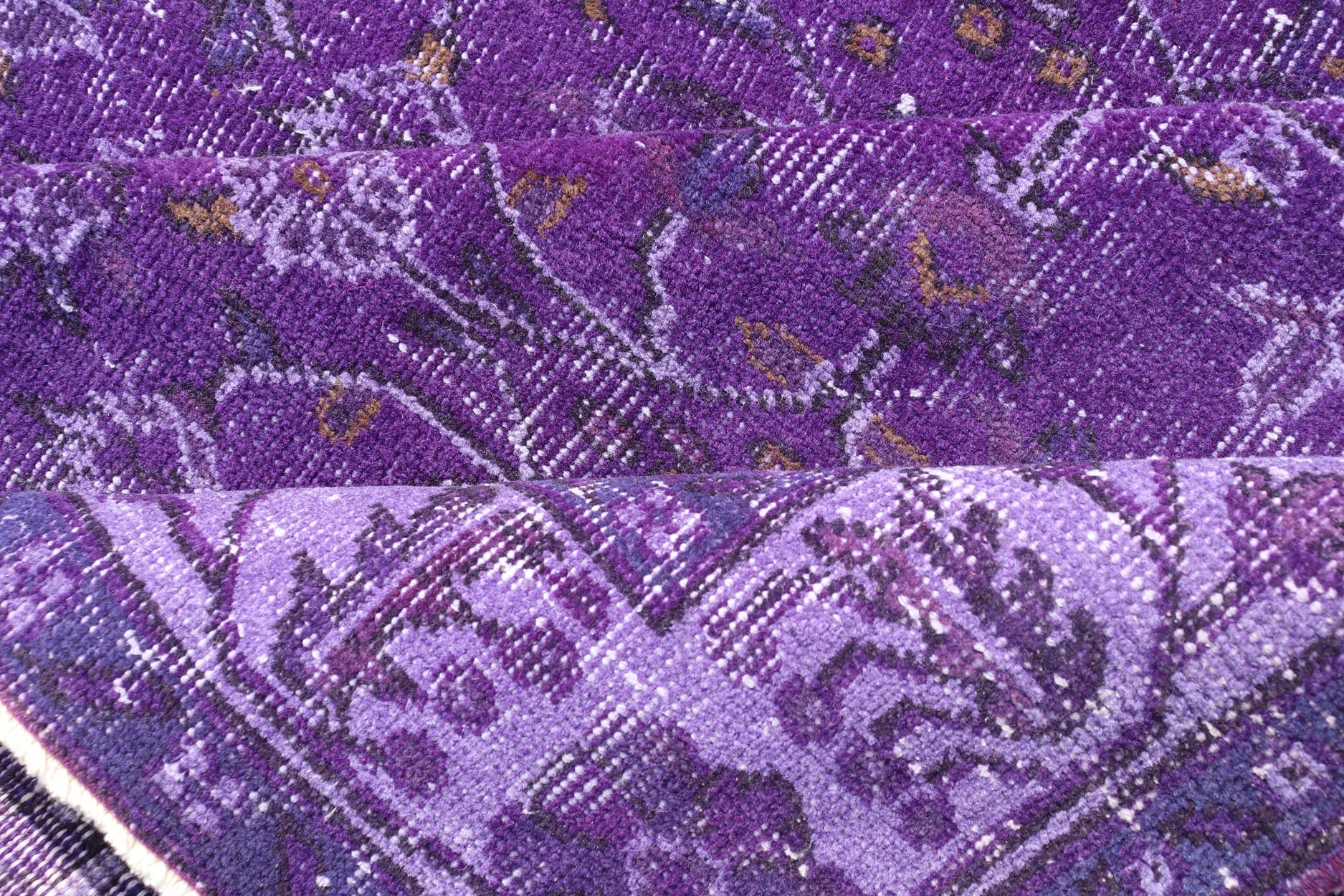 Vintage Overdyed Turkish Oushak with All - Over Floral Design in Purples Measures: 5'8 x 9'2 The field displays a Oushak design, utilizing repeating stylized floral motifs. The border homes a foliage - like pattern complimentary to the field ... - Keivan Woven ArtsEN - P13616 - 17874Rug