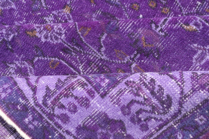 Vintage Overdyed Turkish Oushak with All - Over Floral Design in Purples Measures: 5'8 x 9'2 The field displays a Oushak design, utilizing repeating stylized floral motifs. The border homes a foliage - like pattern complimentary to the field ... - Keivan Woven ArtsEN - P13616 - 17874Rug