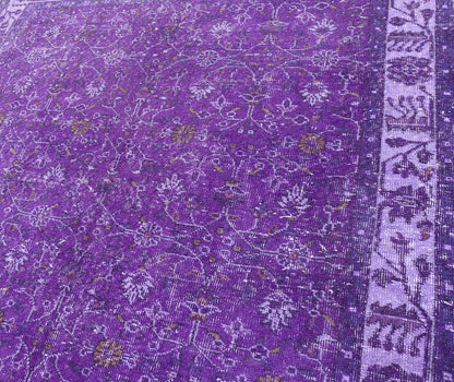 Vintage Overdyed Turkish Oushak with All - Over Floral Design in Purples Measures: 5'8 x 9'2 The field displays a Oushak design, utilizing repeating stylized floral motifs. The border homes a foliage - like pattern complimentary to the field ... - Keivan Woven ArtsEN - P13616 - 17874Rug