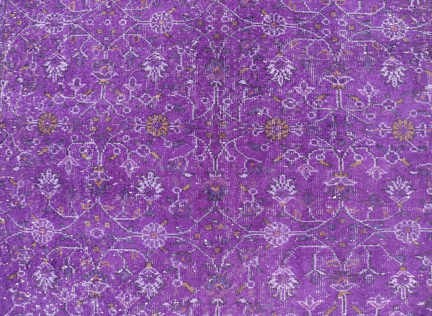 Vintage Overdyed Turkish Oushak with All - Over Floral Design in Purples Measures: 5'8 x 9'2 The field displays a Oushak design, utilizing repeating stylized floral motifs. The border homes a foliage - like pattern complimentary to the field ... - Keivan Woven ArtsEN - P13616 - 17874Rug