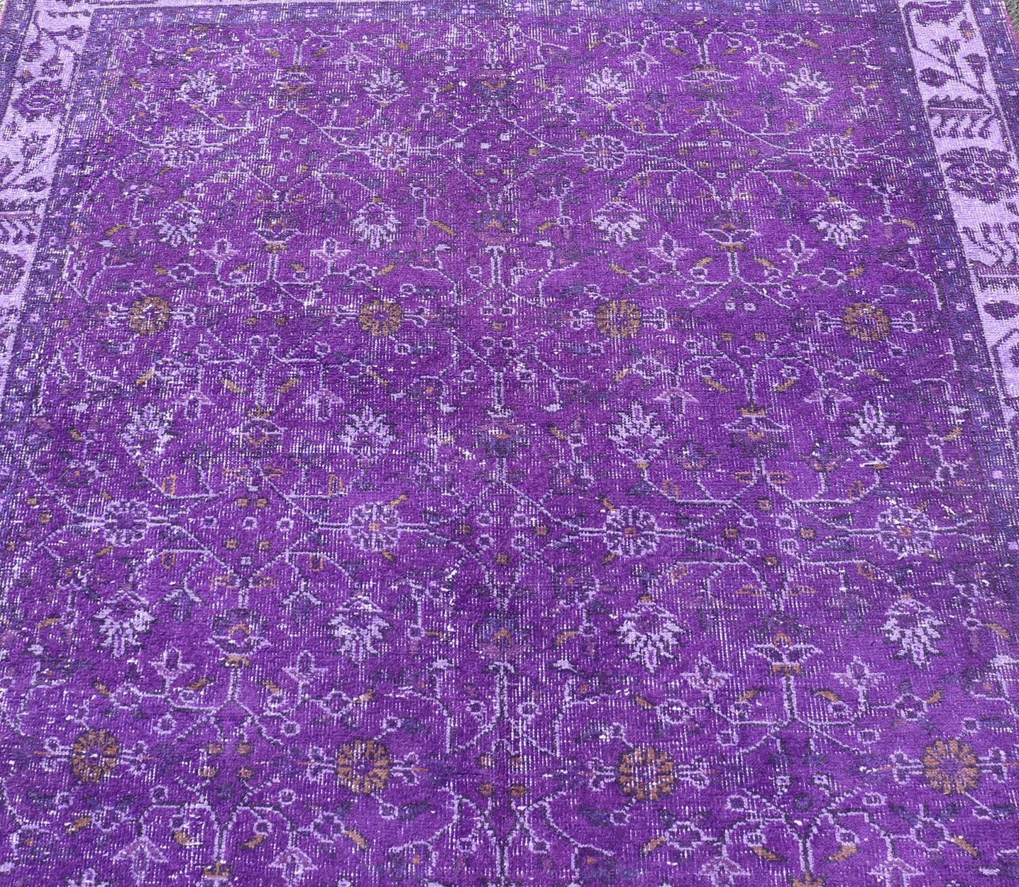 Vintage Overdyed Turkish Oushak with All - Over Floral Design in Purples Measures: 5'8 x 9'2 The field displays a Oushak design, utilizing repeating stylized floral motifs. The border homes a foliage - like pattern complimentary to the field ... - Keivan Woven ArtsEN - P13616 - 17874Rug