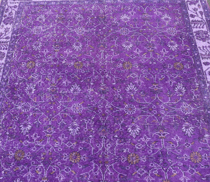 Vintage Overdyed Turkish Oushak with All - Over Floral Design in Purples Measures: 5'8 x 9'2 The field displays a Oushak design, utilizing repeating stylized floral motifs. The border homes a foliage - like pattern complimentary to the field ... - Keivan Woven ArtsEN - P13616 - 17874Rug