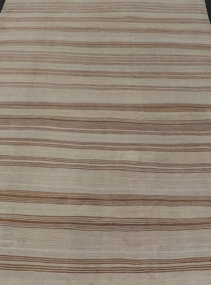 Vintage Turkish Kilim with Horizontal Stripes in Tan, Brown and Gray Measures: 4'10 x 8'2. This vintage flat - woven Kilim features a minimalist design rendered in stripes, set atop a light gray background with subtle brushes of tan, and br... - Keivan Woven ArtsEN - P13786 - 17976Rug