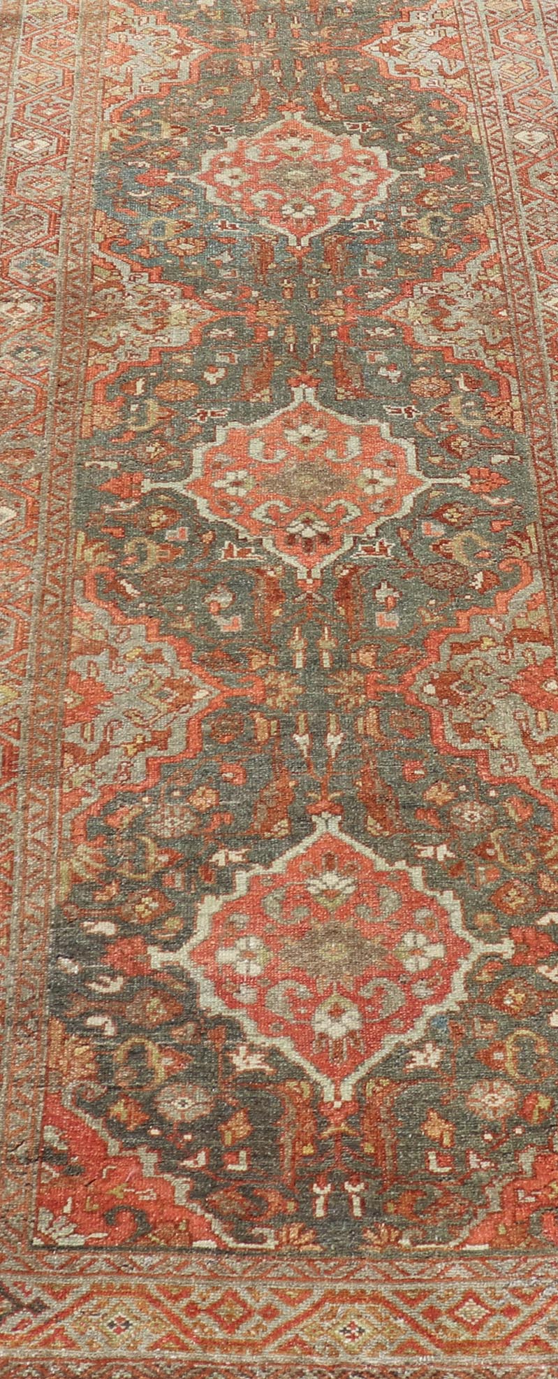 Antique Persian Malayer Runner with All - Over Floral Medallions Design Measures: 2'10 x 9'6 This Persian Malayer features stylized floral medallions contrasting bold colors with dark charcoal and bright red - orange, as well as soft light g... - Keivan Woven ArtsEN - P13902 - 18716Rug