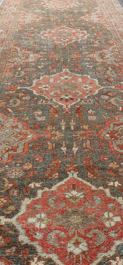 Antique Persian Malayer Runner with All - Over Floral Medallions Design Measures: 2'10 x 9'6 This Persian Malayer features stylized floral medallions contrasting bold colors with dark charcoal and bright red - orange, as well as soft light g... - Keivan Woven ArtsEN - P13902 - 18716Rug