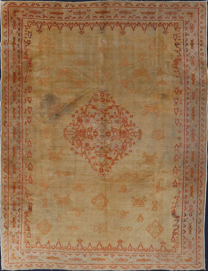 Antique Turkish Borlu Oushak Rug This sophisticated antique borlu Oushak rug was hand woven around the turn of the nineteenth century. It bears an intricate central medallion along with sub geometric motifs carefully placed throughout the field.... - Keivan Woven ArtsF - 0205 - 768Rug