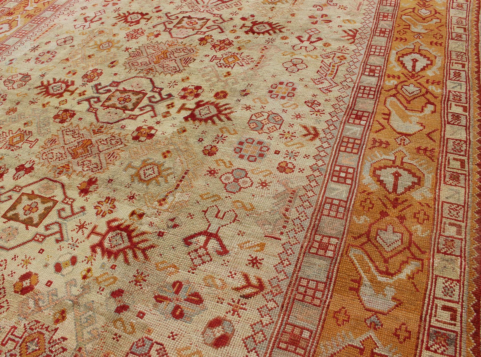 Antique Turkish Oushak Carpet With All - Over Design In Red, Taupe, and Orange. Keivan Woven Arts; rug G - 0901, Country of Origin: Turkey Type: Antique Oushak Design: Floral, Sub - Geometric, All - Over. Measures: 10'5 x 12'5. This impressive Oushak car... - Keivan Woven ArtsG - 0901 - 551Rug