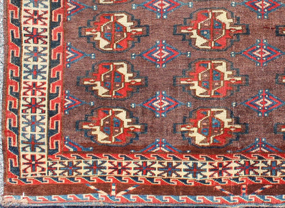 Early 20th Century Antique Tekke Rug with Brown Field and Tribal Motifs in Red, rugg - 1004, country of origin / type: Russia / Tribal, circa 1900 This piece is a rare antique Tekke carpet with delightful colors. The field consists of a chocolate ... - Keivan Woven ArtsG - 1004 - 2299Rug