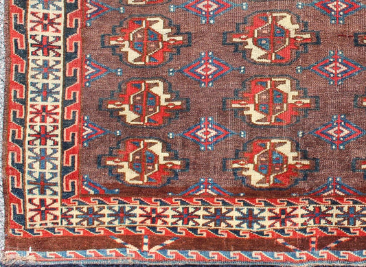Early 20th Century Antique Tekke Rug with Brown Field and Tribal Motifs in Red, rugg - 1004, country of origin / type: Russia / Tribal, circa 1900 This piece is a rare antique Tekke carpet with delightful colors. The field consists of a chocolate ... - Keivan Woven ArtsG - 1004 - 2299Rug