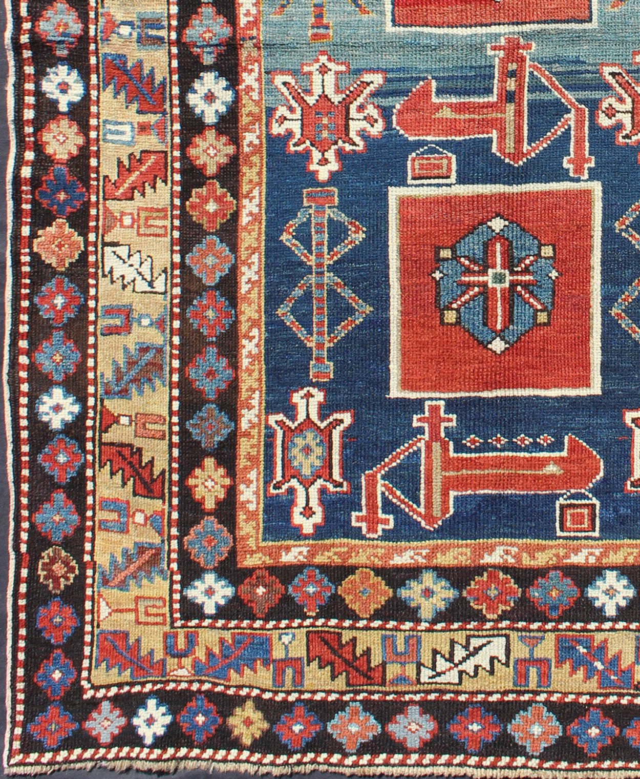 Antique Hand Knotted Qaraqashli Caucasian Rug with Tribal Medallion Design The archetypal motifs in this piece are accompanied by a tower of stacked polygons with small tribal design. Each decorative foil is embellished with eight - armed brac... - Keivan Woven ArtsG - 1203 - 2643Rug