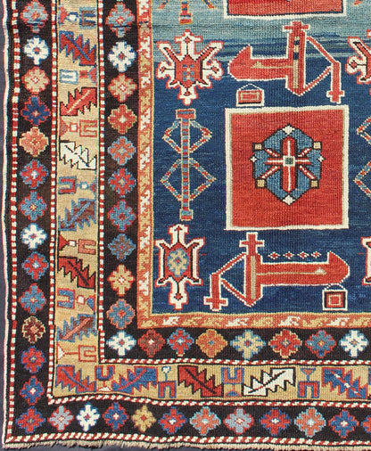 Antique Hand Knotted Qaraqashli Caucasian Rug with Tribal Medallion Design The archetypal motifs in this piece are accompanied by a tower of stacked polygons with small tribal design. Each decorative foil is embellished with eight - armed brac... - Keivan Woven ArtsG - 1203 - 2643Rug