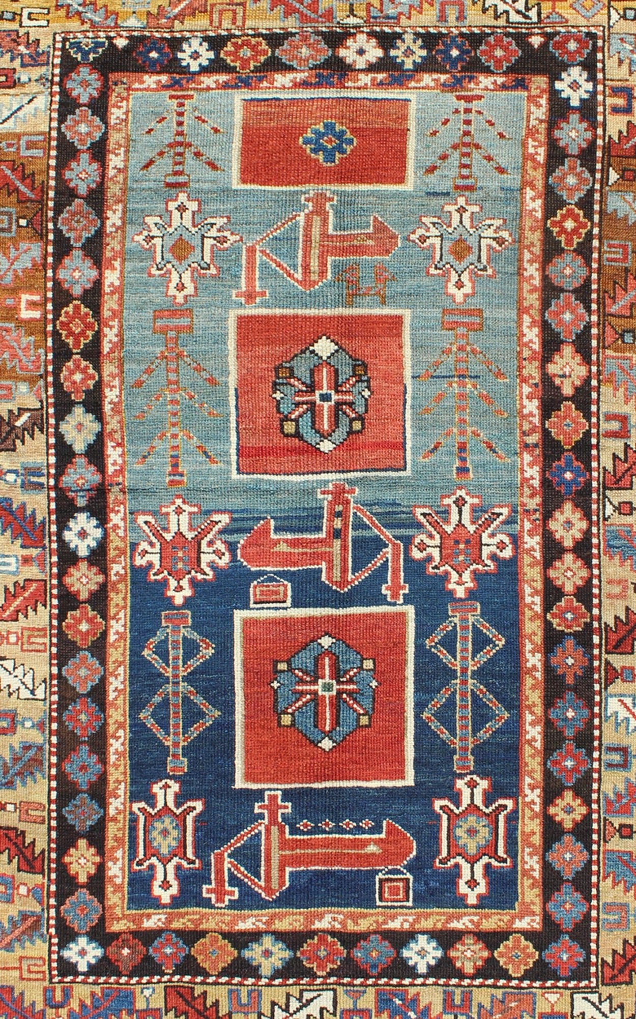 Antique Hand Knotted Qaraqashli Caucasian Rug with Tribal Medallion Design The archetypal motifs in this piece are accompanied by a tower of stacked polygons with small tribal design. Each decorative foil is embellished with eight - armed brac... - Keivan Woven ArtsG - 1203 - 2643Rug
