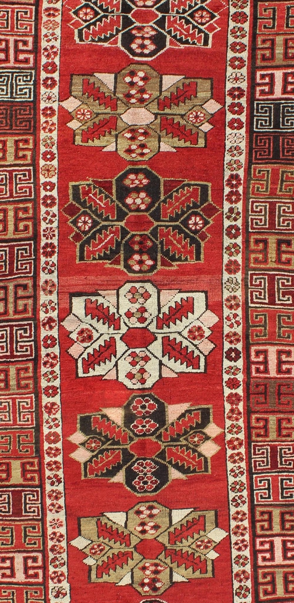 Red background antique Kazak runner with medallions and tribal design, Keivan Woven Arts / rug g - 1204, country of origin / type: Caucasus / Kazak, circa 1900 The field design of this antique Kazak runner features medallions of differing colors s... - Keivan Woven ArtsG - 1204 - 2271Rug