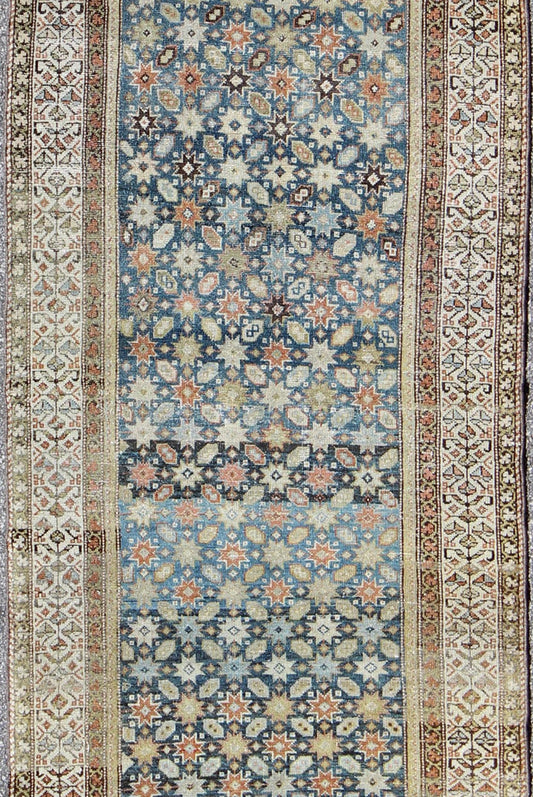 Colorful antique Persian Malayer runner with blue background, floral motifs, rug gld - 7362, country of origin / type: Iran / Malayer, circa 1910 This Persian Malayer runner from early 20th century Iran features an all - over geometric floral patter... - Keivan Woven ArtsGLD - 7362 - 9094Rug