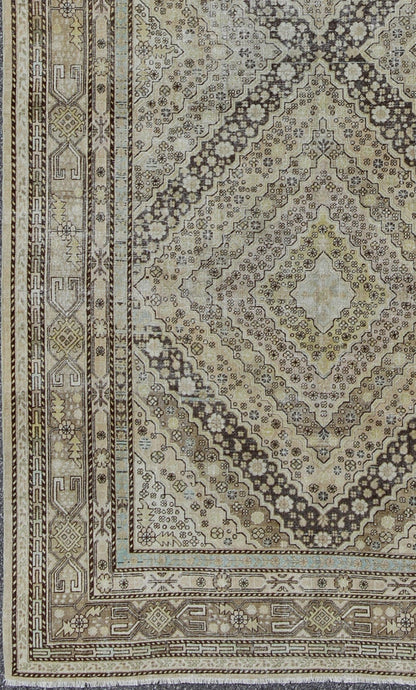 Antique Turkestanian Khotan rug with paired diamond geometric medallions, rug gld - 8495, country of origin / type: East Turkestan / Khotan, circa 1910. This delicately rendered antique Khotan rug was handcrafted in Turkestan during the early part... - Keivan Woven ArtsGLD - 8495 - 9098Rug