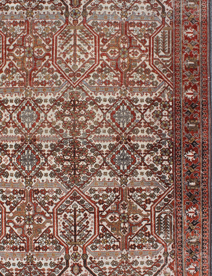 Antique Persian Joshegan Rug in Ivory Background with Red, Green and Blue This antique Joshegan rug from 1920s Iran was handwoven and bears a remarkably unique all - over interconnected Sub - geometric design, consisting mostly of diamond shapes and re... - Keivan Woven ArtsGNG - 4741 - 9898Rug