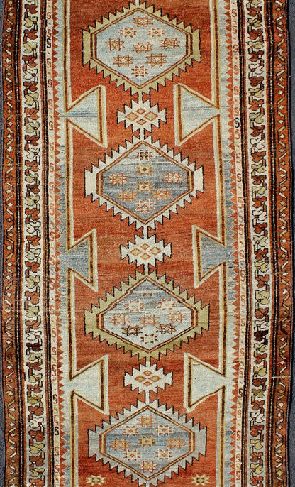Burnt Orange Antique Hand Knotted Persian Hamedan Runner With Tribal Medallions Burnt orange antique Persian Hamedan runner with Tribal Medallions, Keivan Woven Arts / rug gng - 4742, country of origin / type: Iran / Hamedan, circa 1920 Thi... - Keivan Woven ArtsGNG - 4742 - 9902Rug